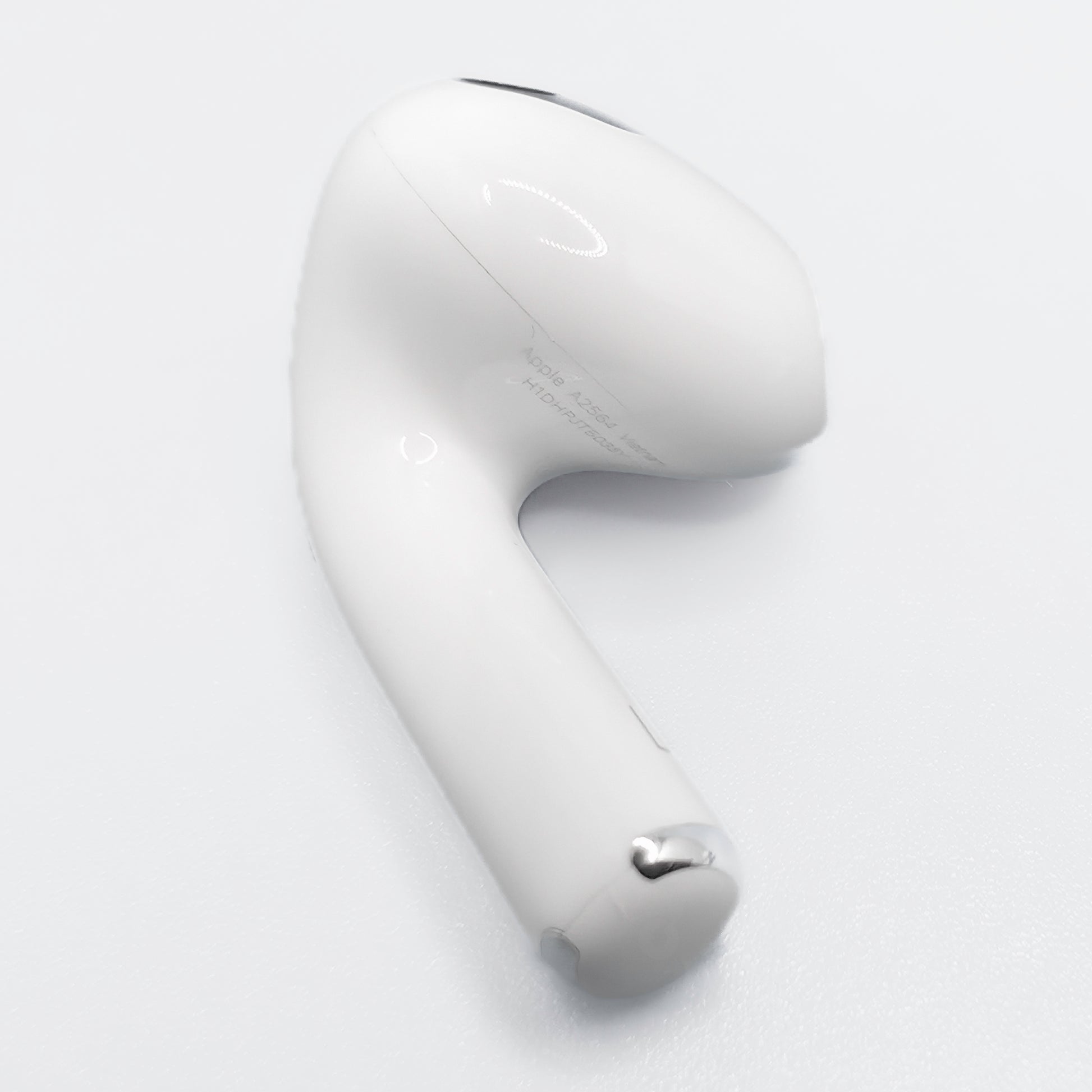 Apple AirPod 3rd Generation Left Side  photo of model number A2564 on bottom of AirPod