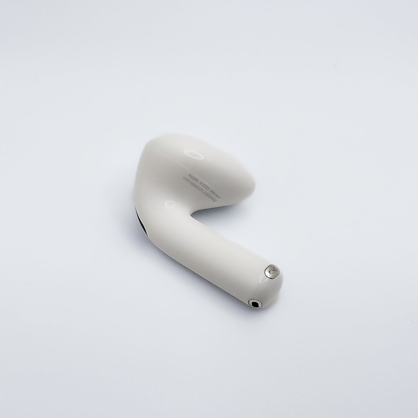 Apple AirPod 4 Left AirPod photo of model number A3053 on bottom