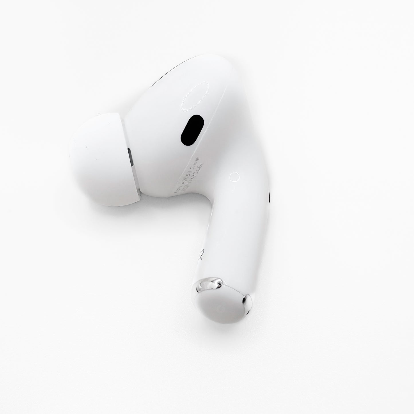 Apple AirPod Pro 1 Right AirPod photo of model numbers A2083 on bottom of AirPod