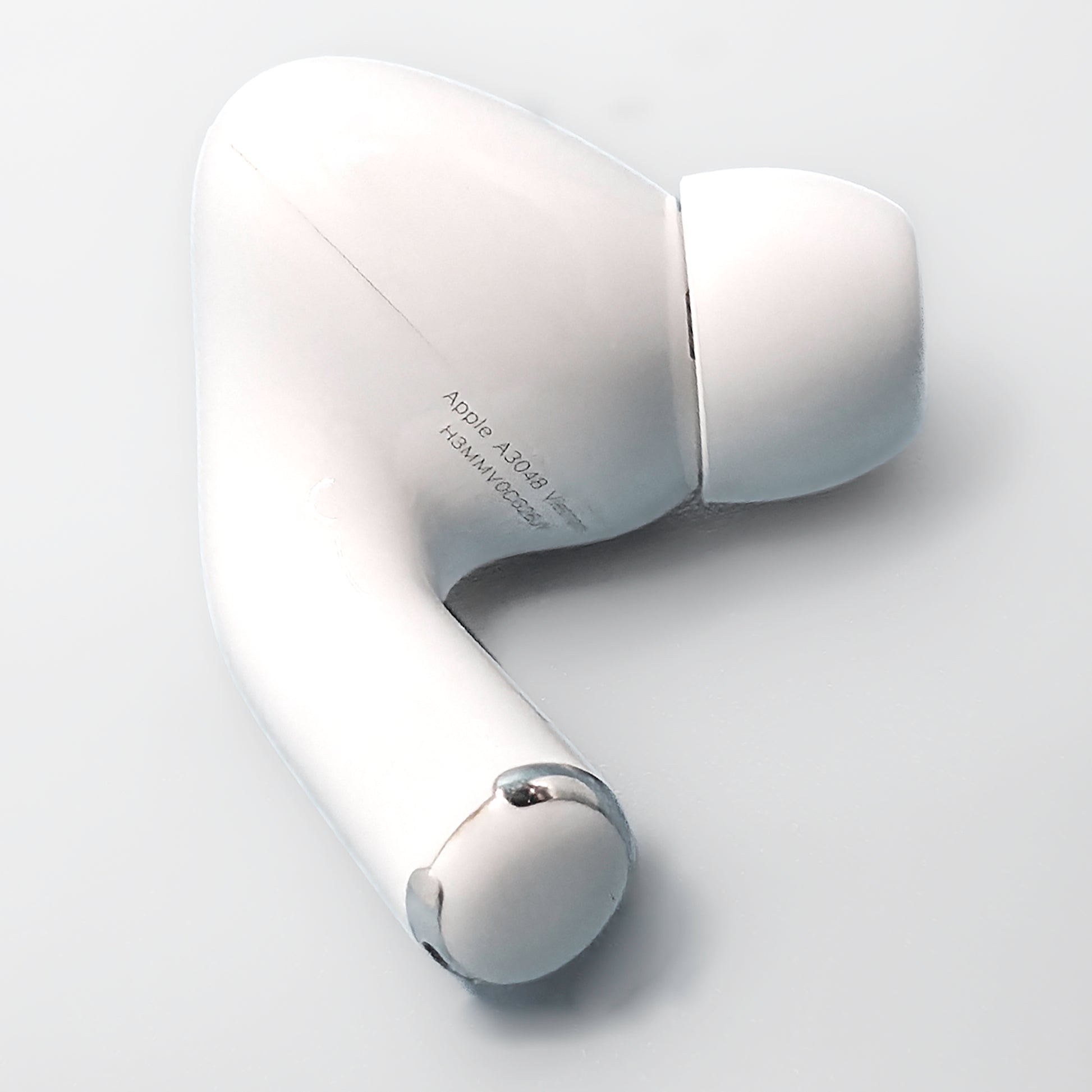 Apple AirPods Pro 2 Left AirPod photo of model number A3048 (USB-C) on bottom of AirPod