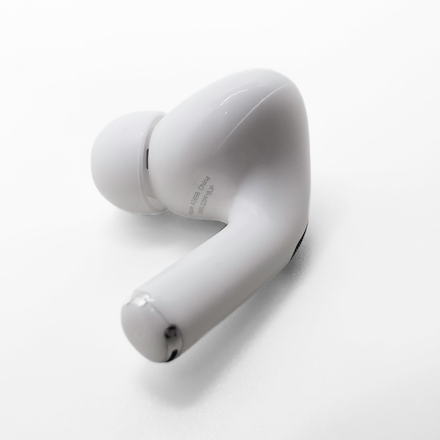 Apple AirPods Pro 2 Right AirPod photo of model number A2698 (lightning) on bottom of AirPod