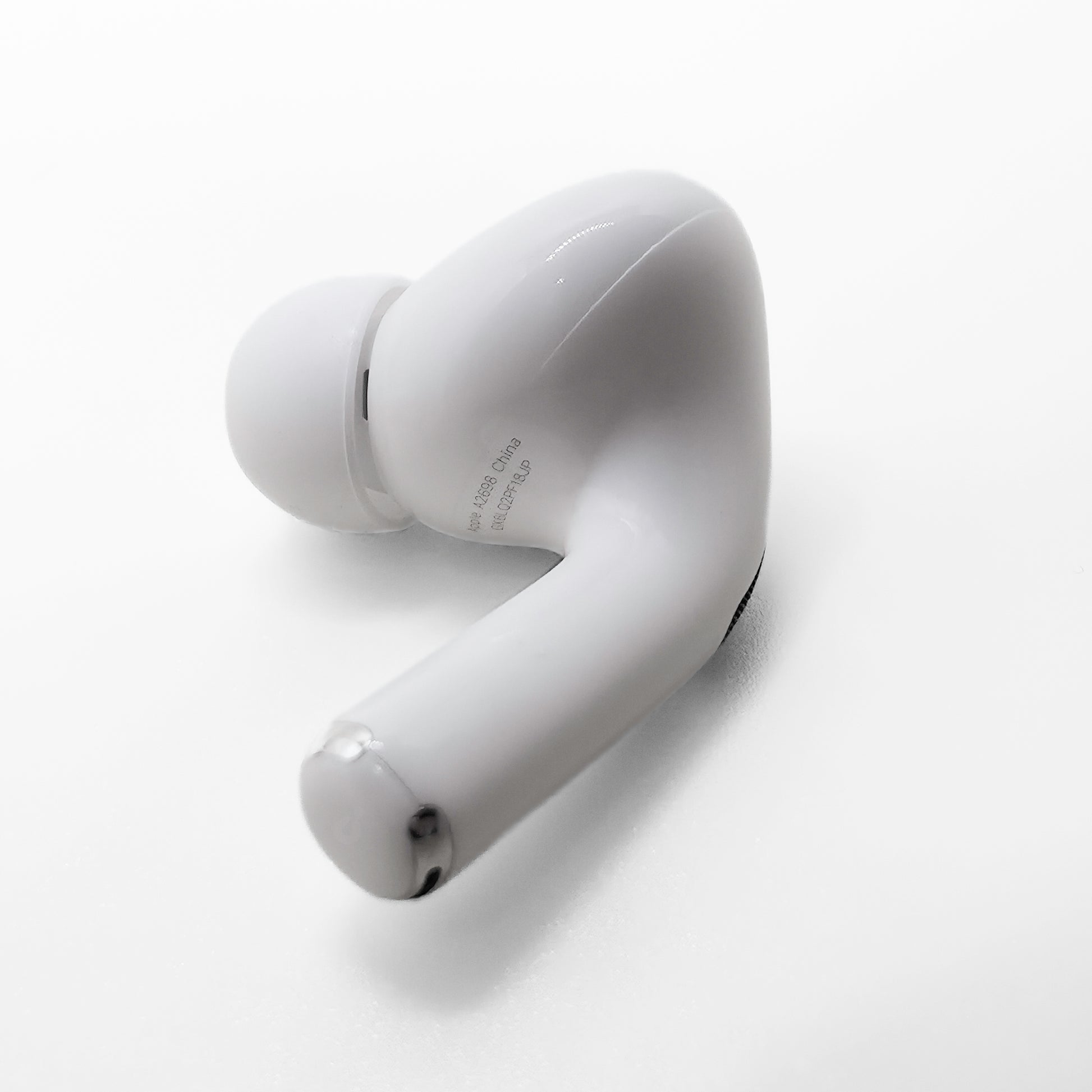 Apple AirPods Pro 2 Right AirPod photo of model number A2698 (lightning) on bottom of AirPod