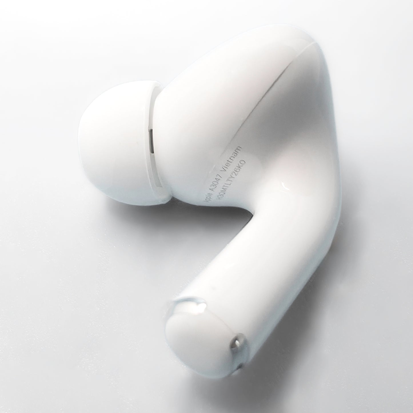 Apple AirPods Pro 2 Right AirPod photo of model number A3047 (USB-C) on bottom of AirPod