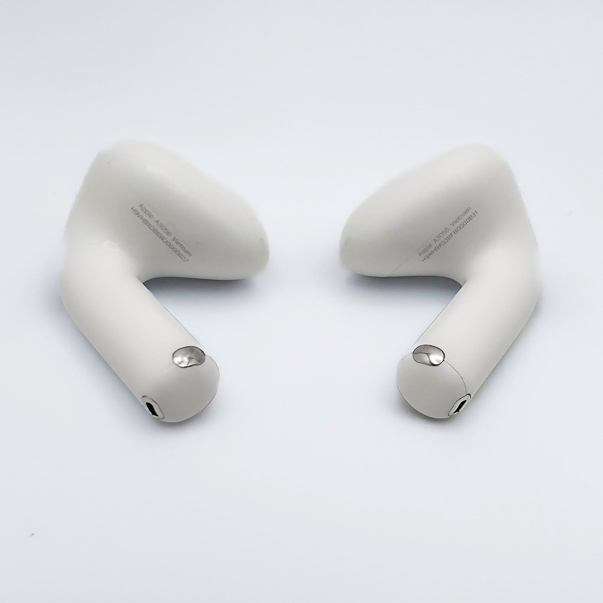 Apple AirPods 4 with ANC photo of the model numbers on the bottom of the AirPods