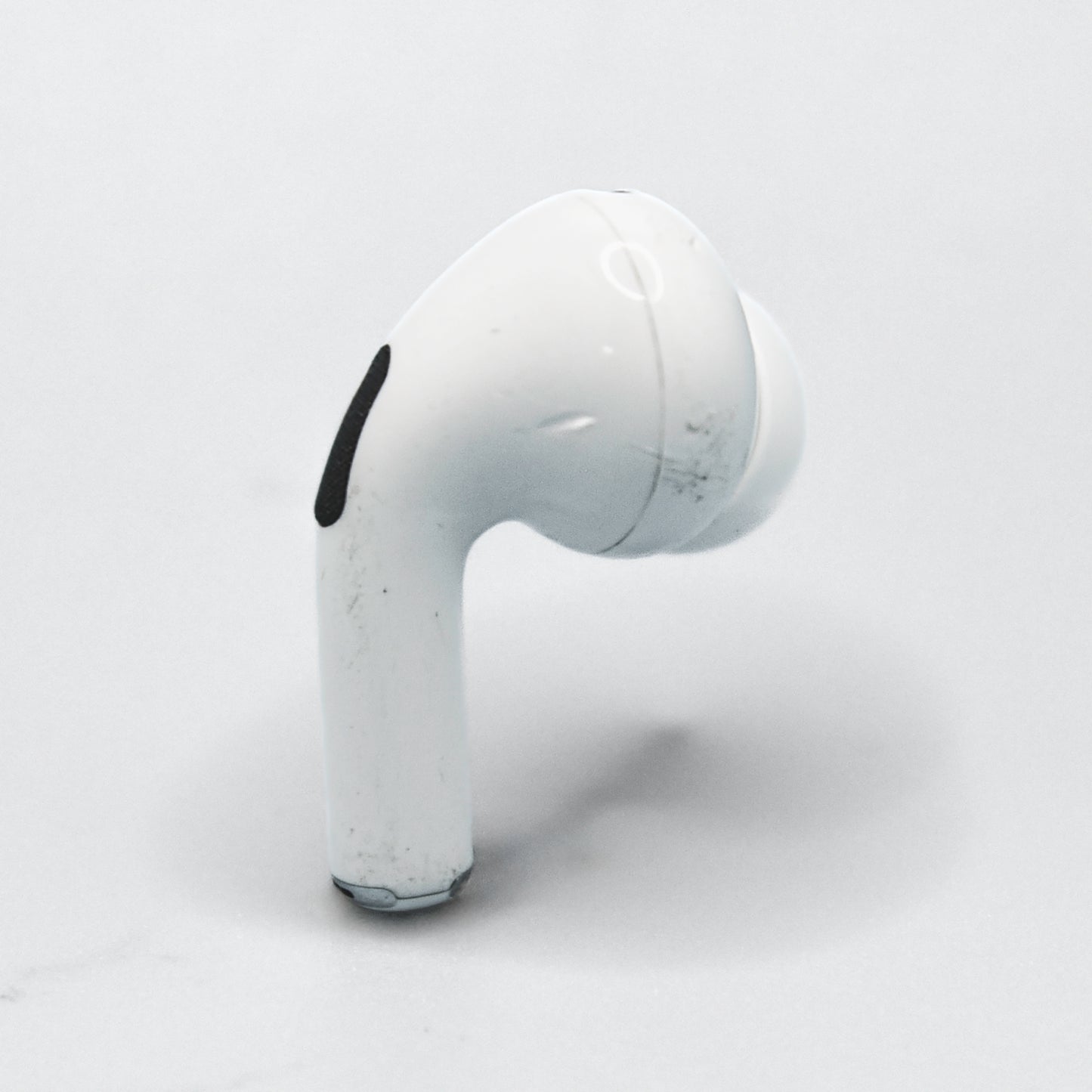 Apple AirPod Pro 2 Well Loved Left Side Replacement AirPod view of the side