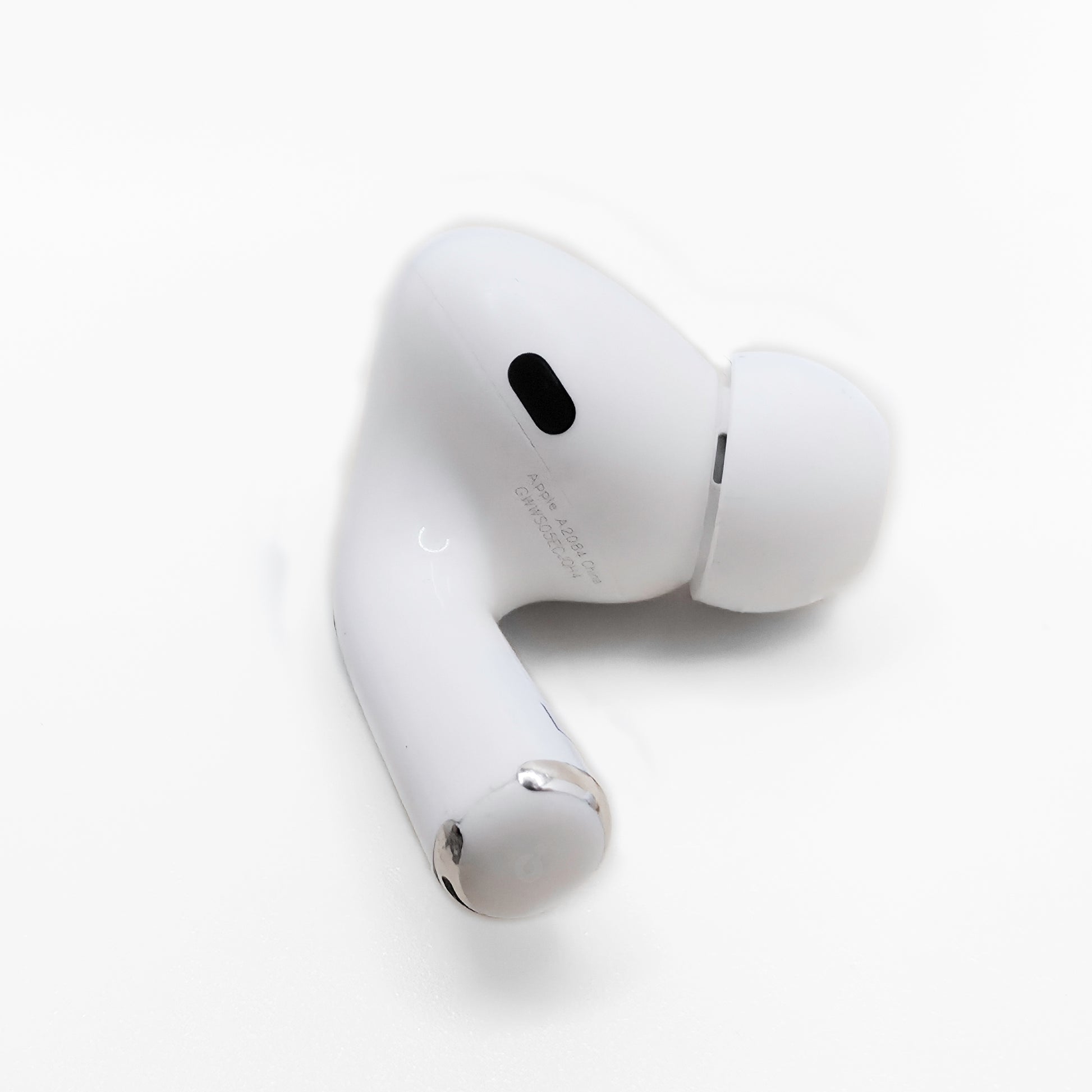Apple AirPod Pro 1 Left AirPod photo of model number A2084 on bottom of AirPod
