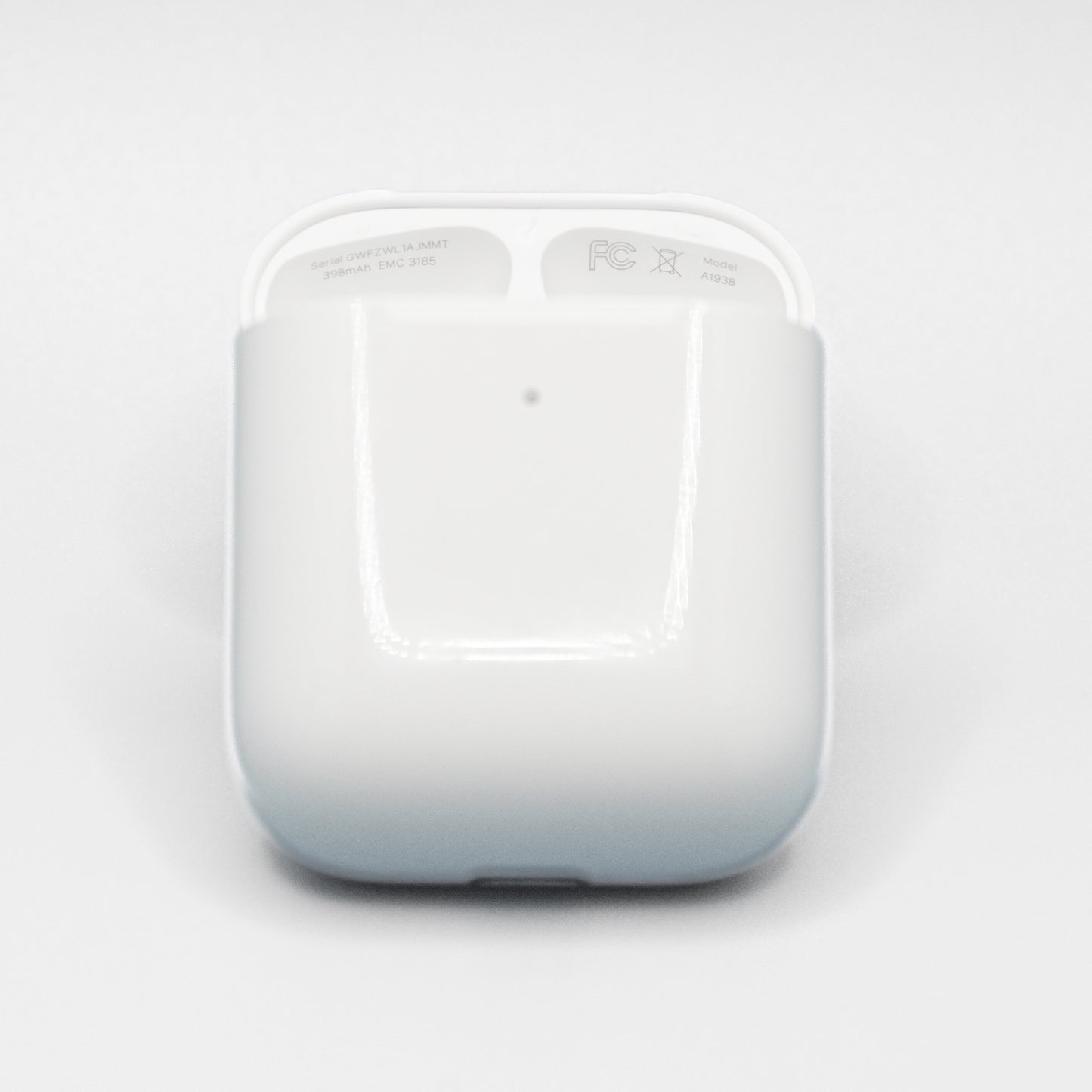 Apple AirPods 2 Wireless Charging Case model number A1938 visible on right of lid