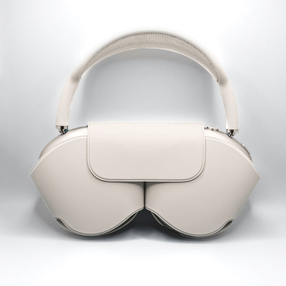 Apple AirPods Max Starlight in their Smart Case