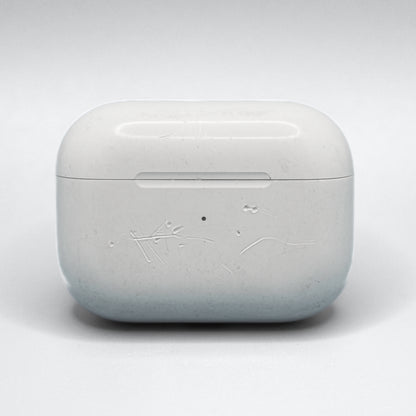 Well loved cases may have scratches, bite marks, or engravings. This is an example of damage on an AirPods Pro 1 Case.